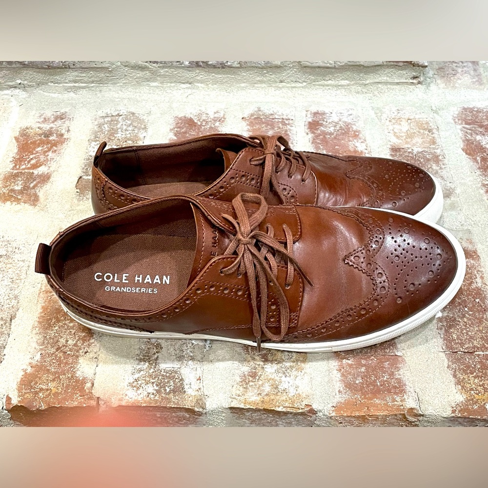 Cole Haan leather top sneakers.